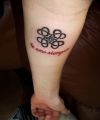 celtic knot and text tattoo